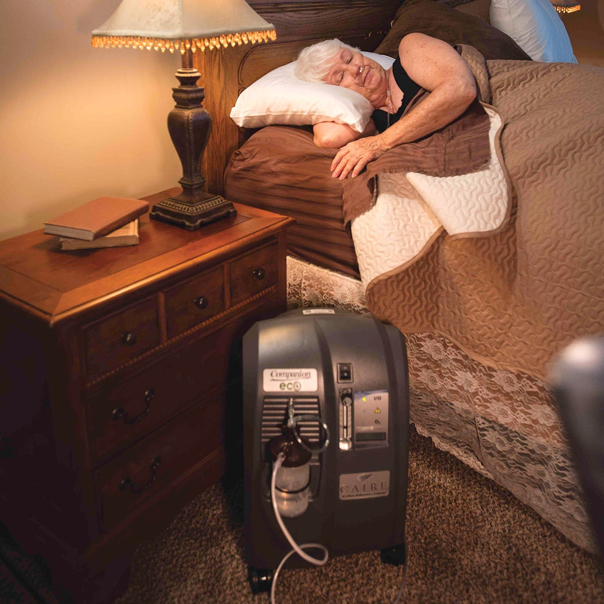 woman sleeping with companion 5 oxygen concentrator