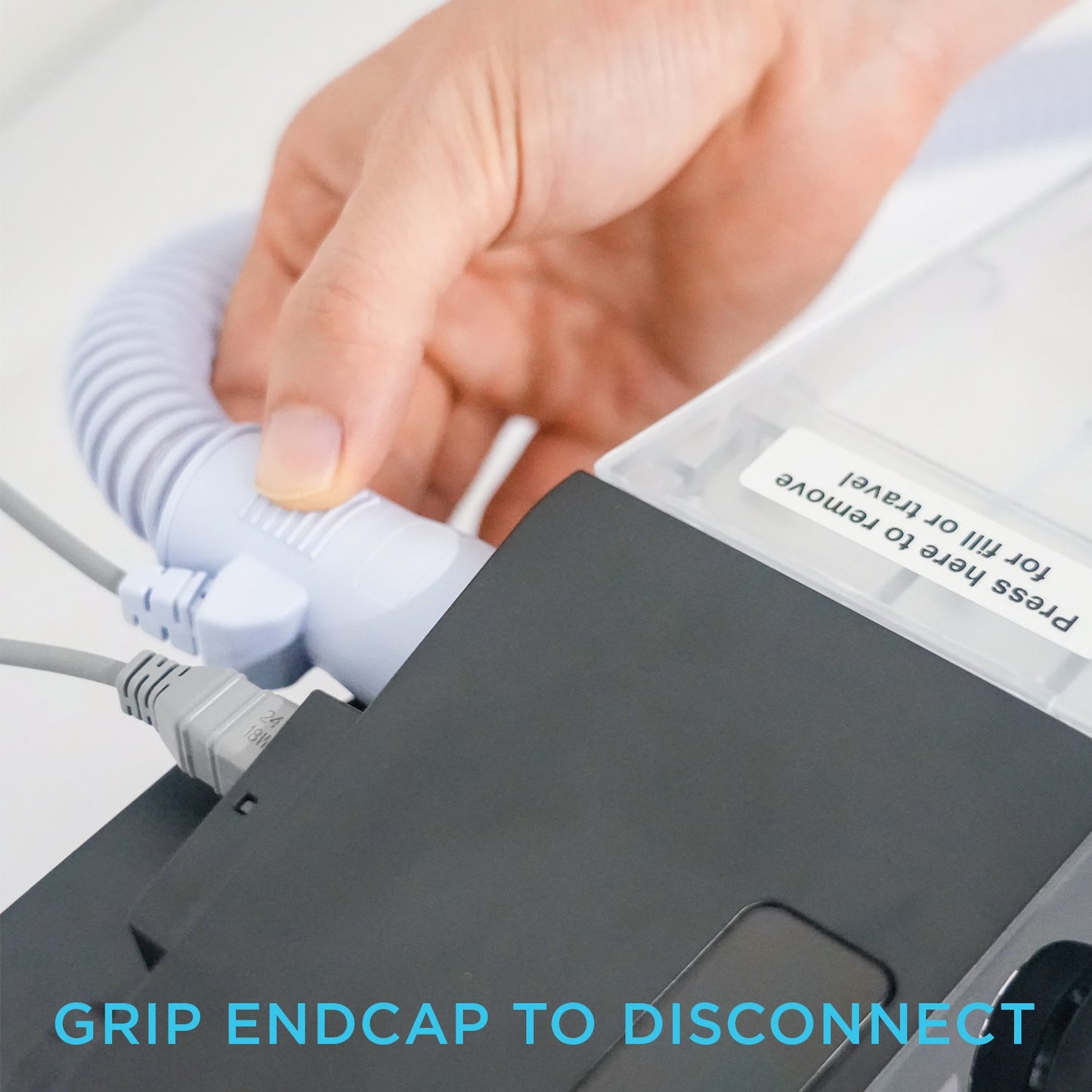 Hand disconnecting heated tubing from a CPAP Machine