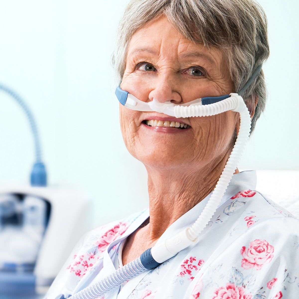 Woman wearing Optiflow High Flow myAIRVO Cannula