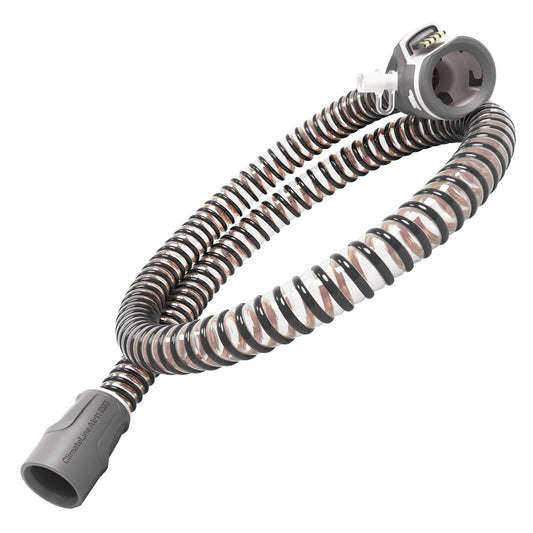 Coiled hose with gray connectors on a white background