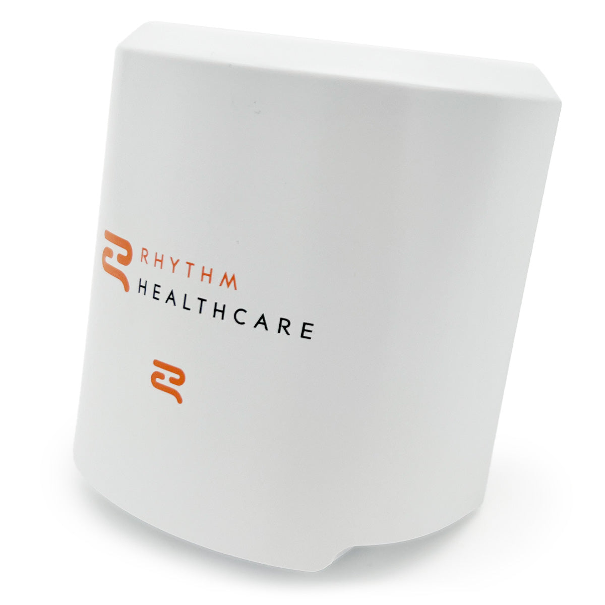 A white battery pack with the Rhythm Healthcare logo printed on it.