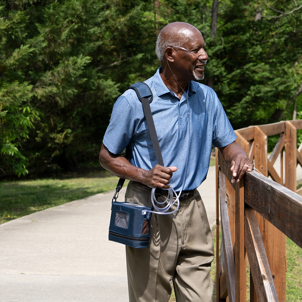 Man Outside with Rhythm P2 Oxygen Concentrator