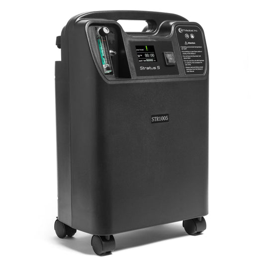 A black Stratus 5 Oxygen Concentrator with control buttons and a digital display on the front panel, set against a white background.