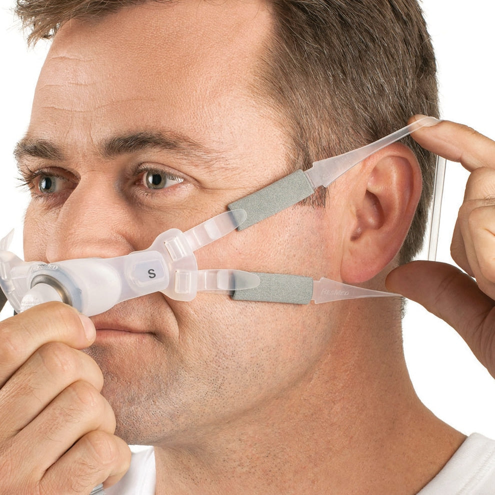 Man Putting on Swift FX Bella Headgear