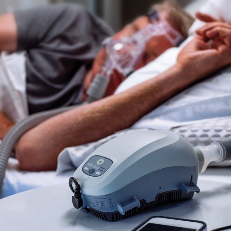 Man Sleeping with Transcend Auto CPAP
