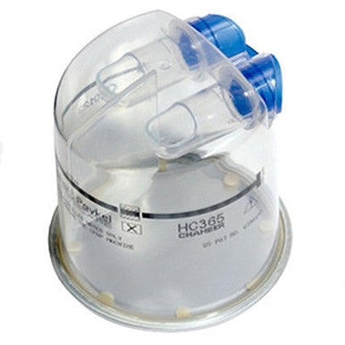 Medical device with clear chamber and blue top on a white background