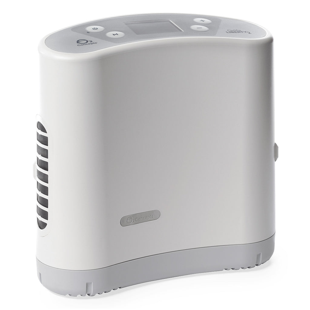 A portable oxygen concentrator, white in color, with a digital display and several control buttons.