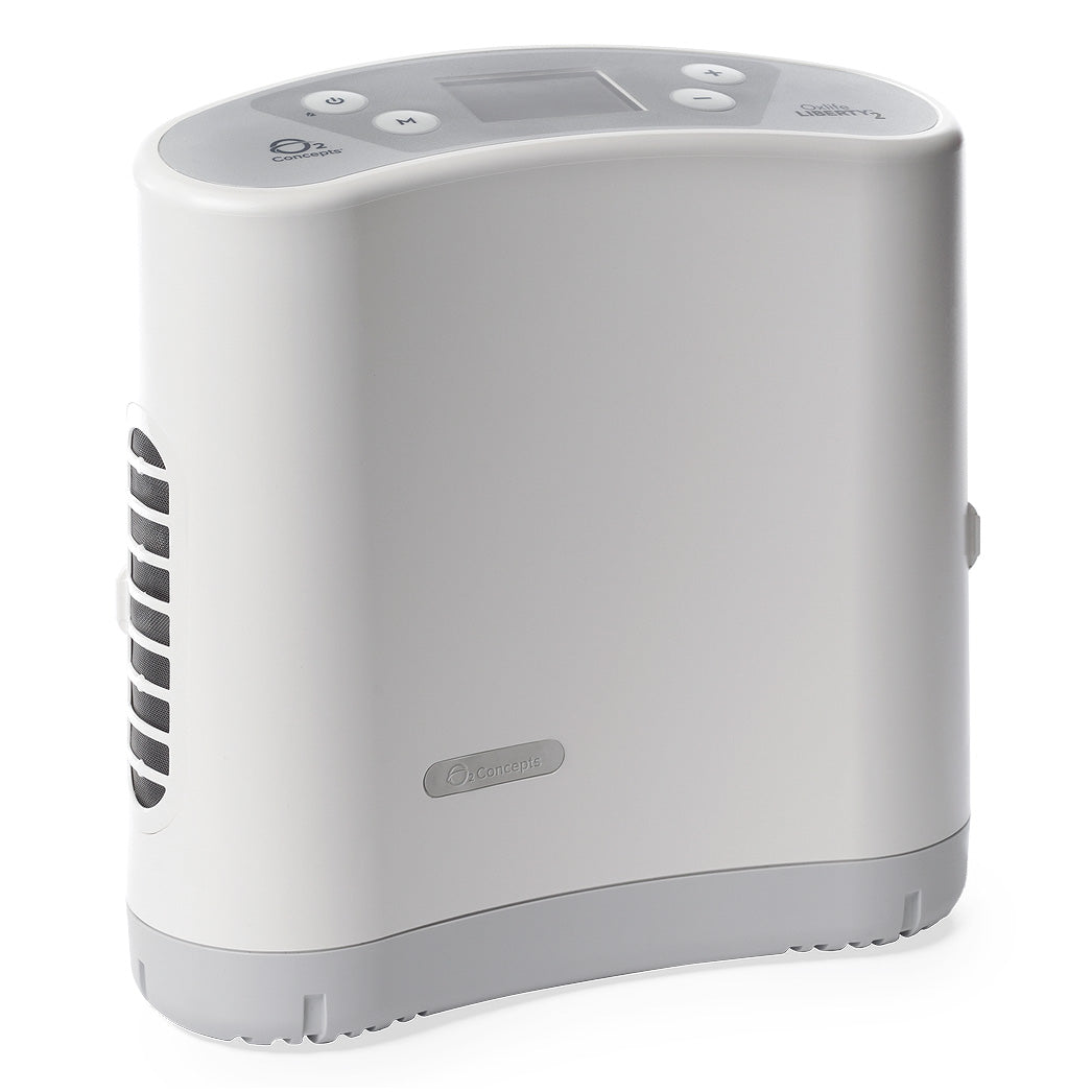 A portable oxygen concentrator, white in color, with a digital display and several control buttons.