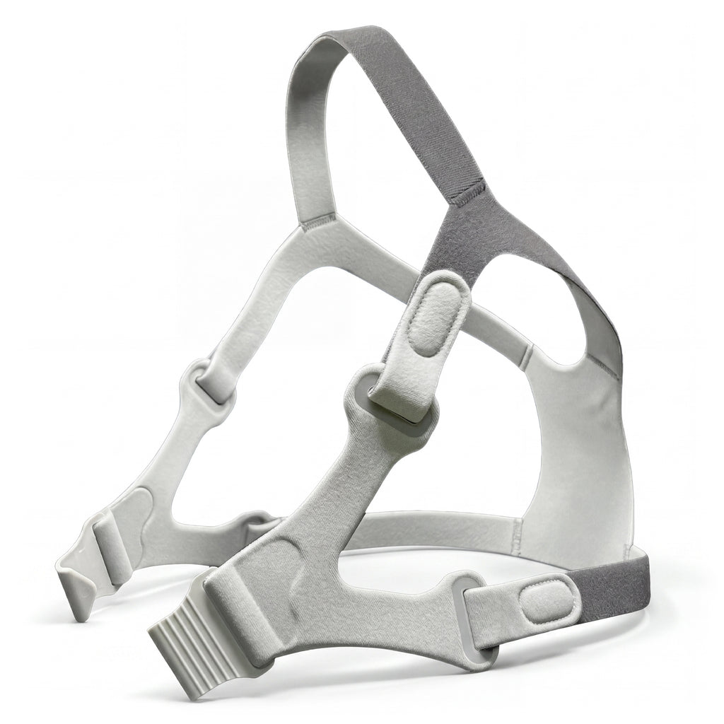 Gray CPAP headgear on a white background