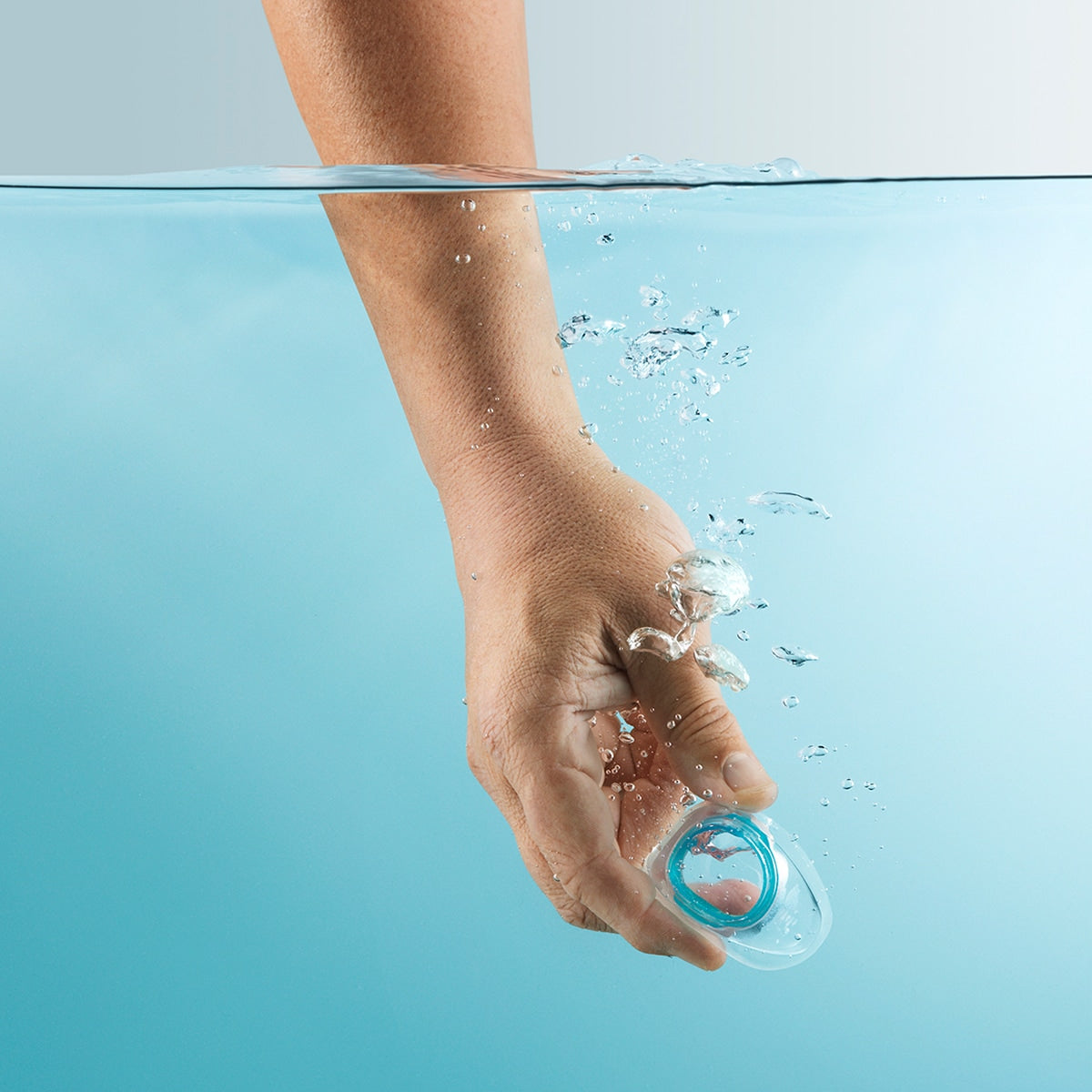 Hand in Water Holding Evora Nasal Cushion 