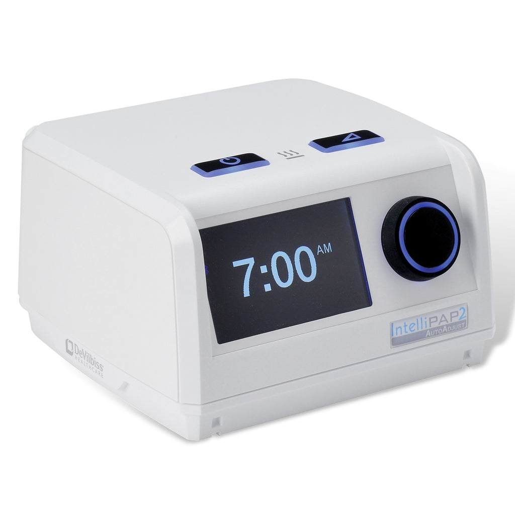 A white IntelliPAP 2 AutoAdjust Auto-CPAP machine with a digital display showing the time 7:00 AM, blue accents, and a few control buttons.