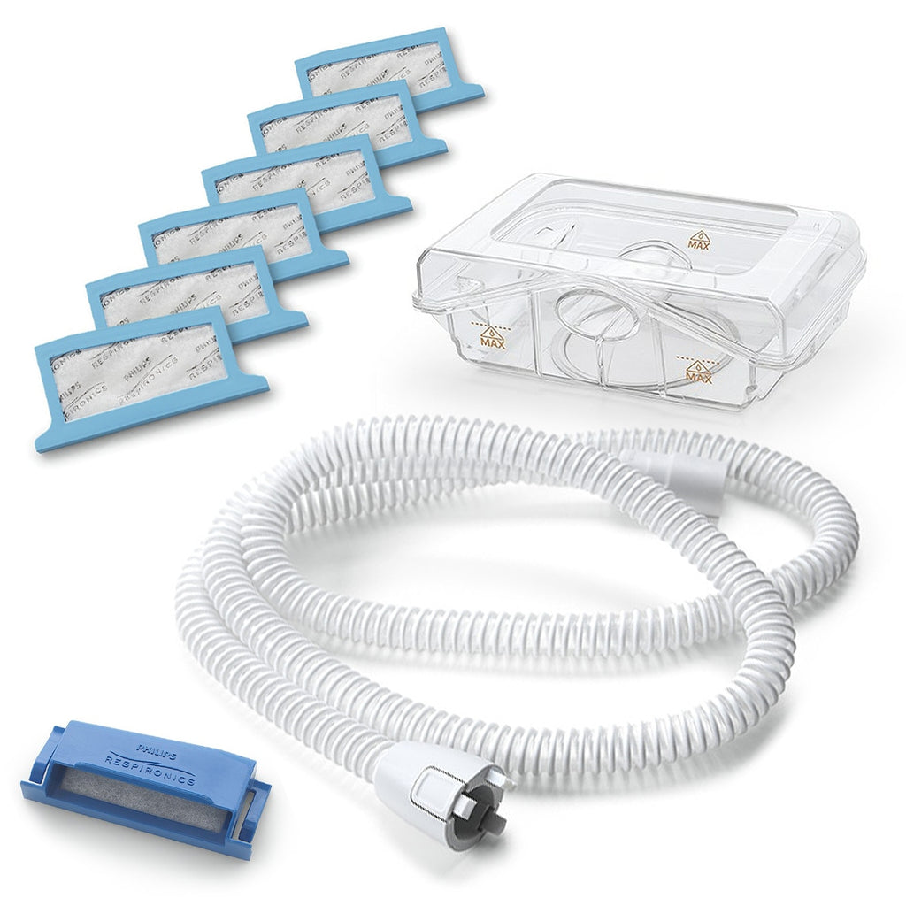 A set of accessories for Philips Respironics CPAP and BiPAP machines, including filters, heated tubing, and a humidifier water chamber.