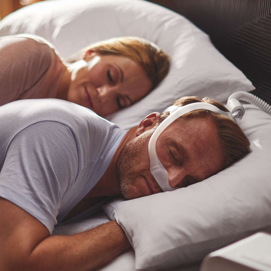 Man Sleeping in Bed with Dreamwear Mask On