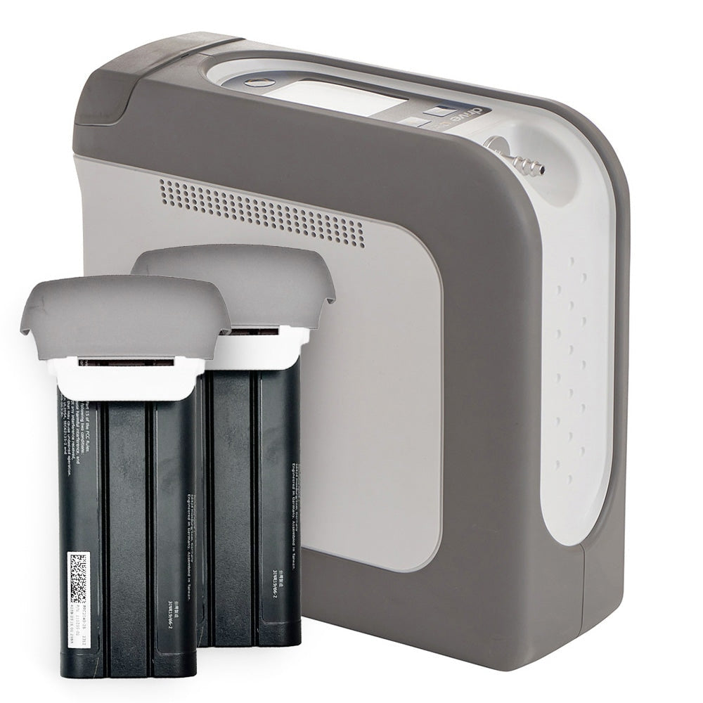 Gray electronic device with three black cylindrical filters on a white background