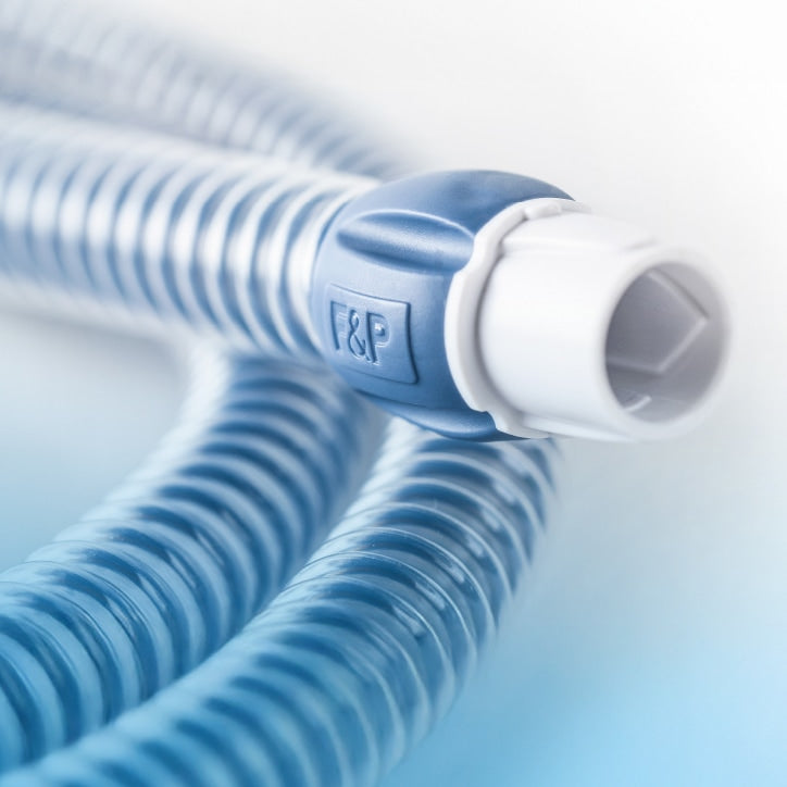 Blue and white hose with a branded fitting on a light blue background