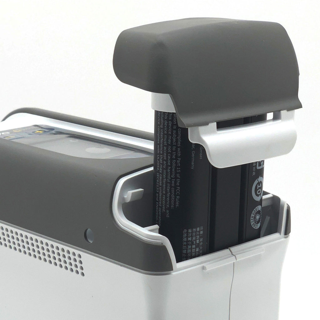 Liberty Oxygen Concentrator Battery Inserting into Concentrator