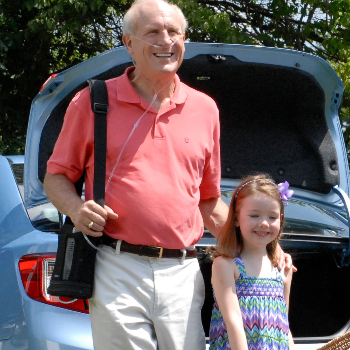 Man Carrying Inogen One G3 Concentrator in Bag 