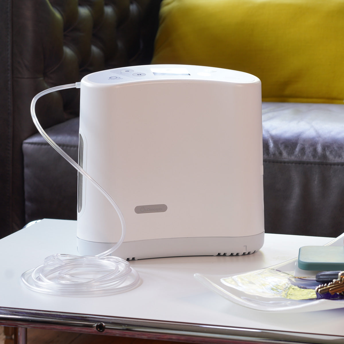 Oxlife Liberty Portable Oxygen Concentrator on a table 