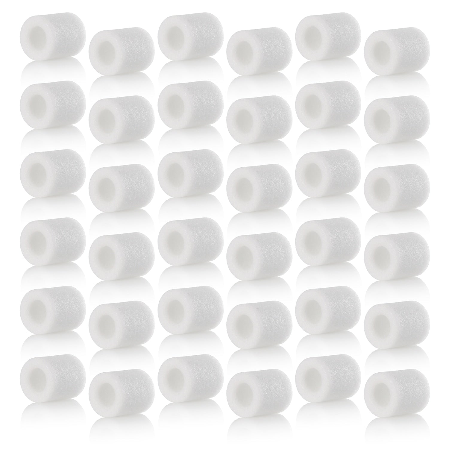 Multiple white cylindrical filters arranged in rows on a white background