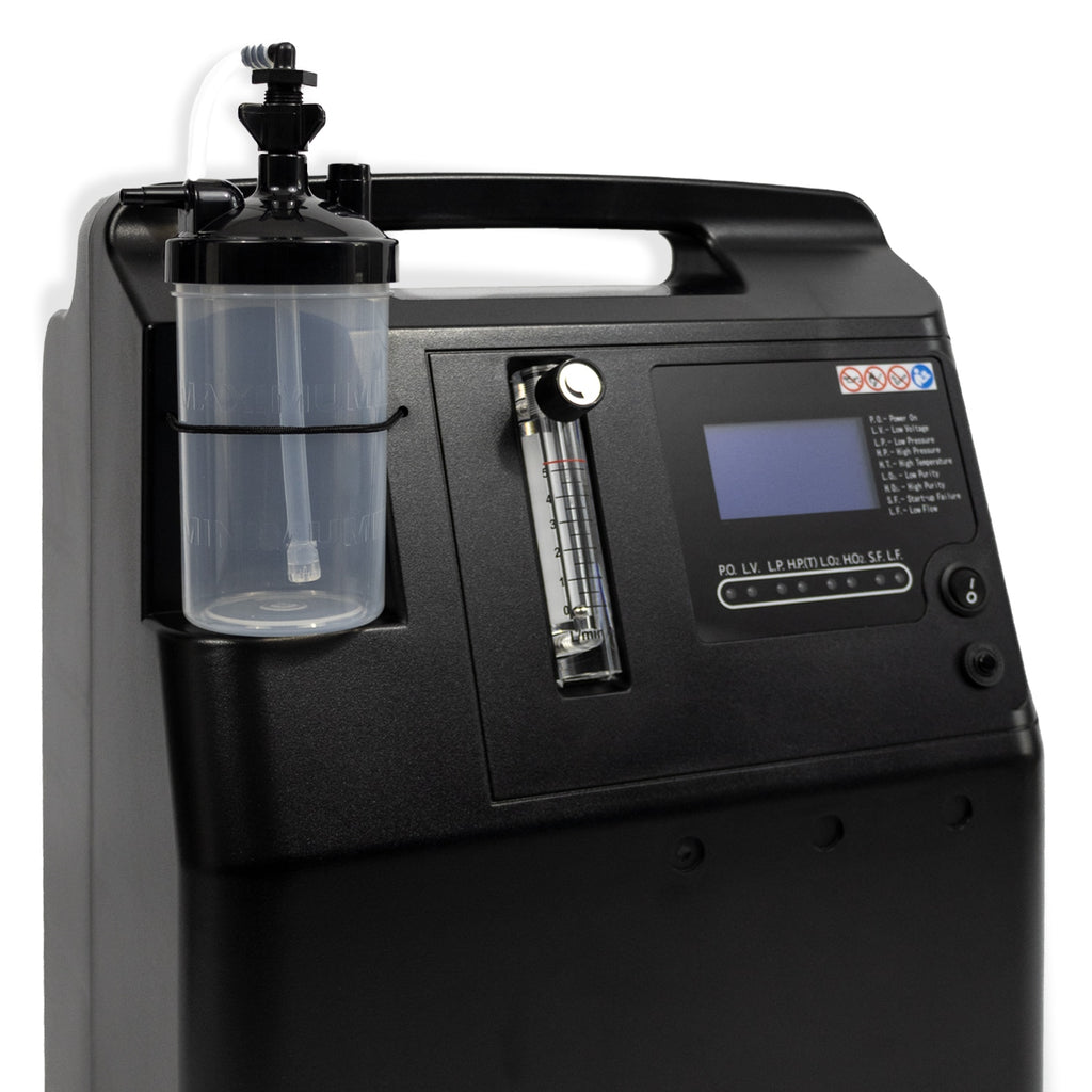 Black medical device with a digital display and control panel on a white background