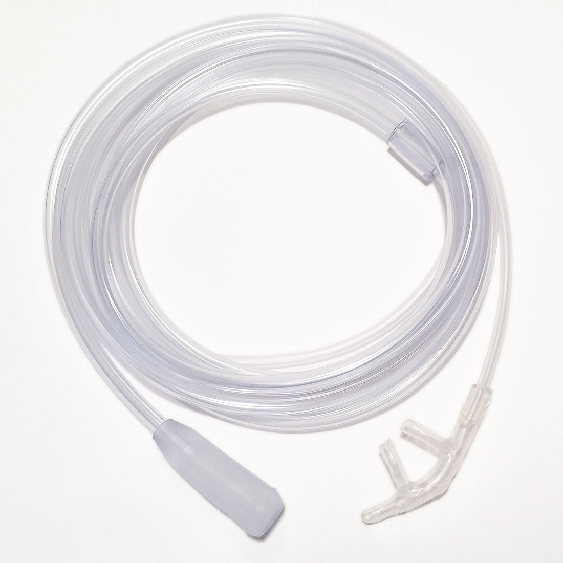 A single sided nasal cannula with a 4 foot oxygen supply tubing, predominantly clear in color with some parts translucent.