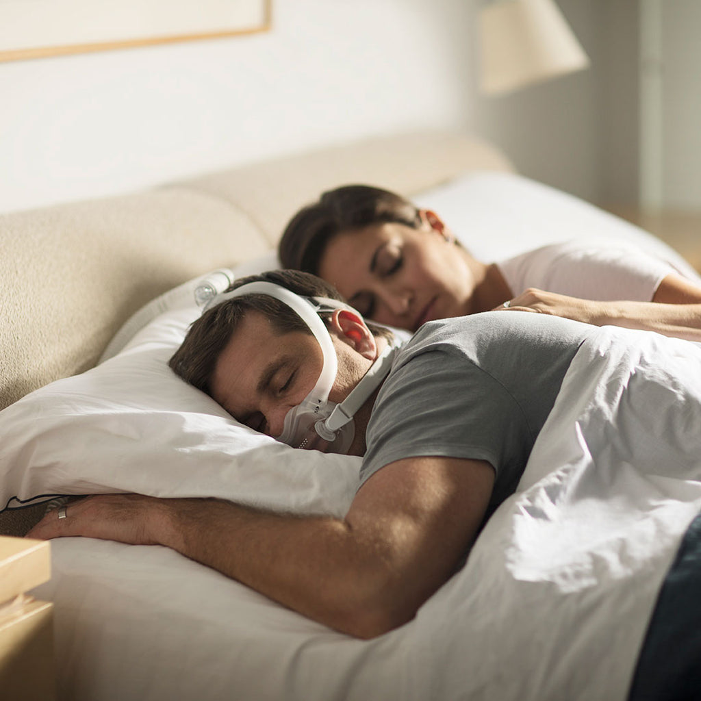 Man Sleeping In Bed With Dreamwear Full Face Mask On 