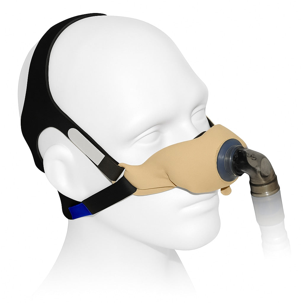 CPAP mask on a mannequin head with a white background