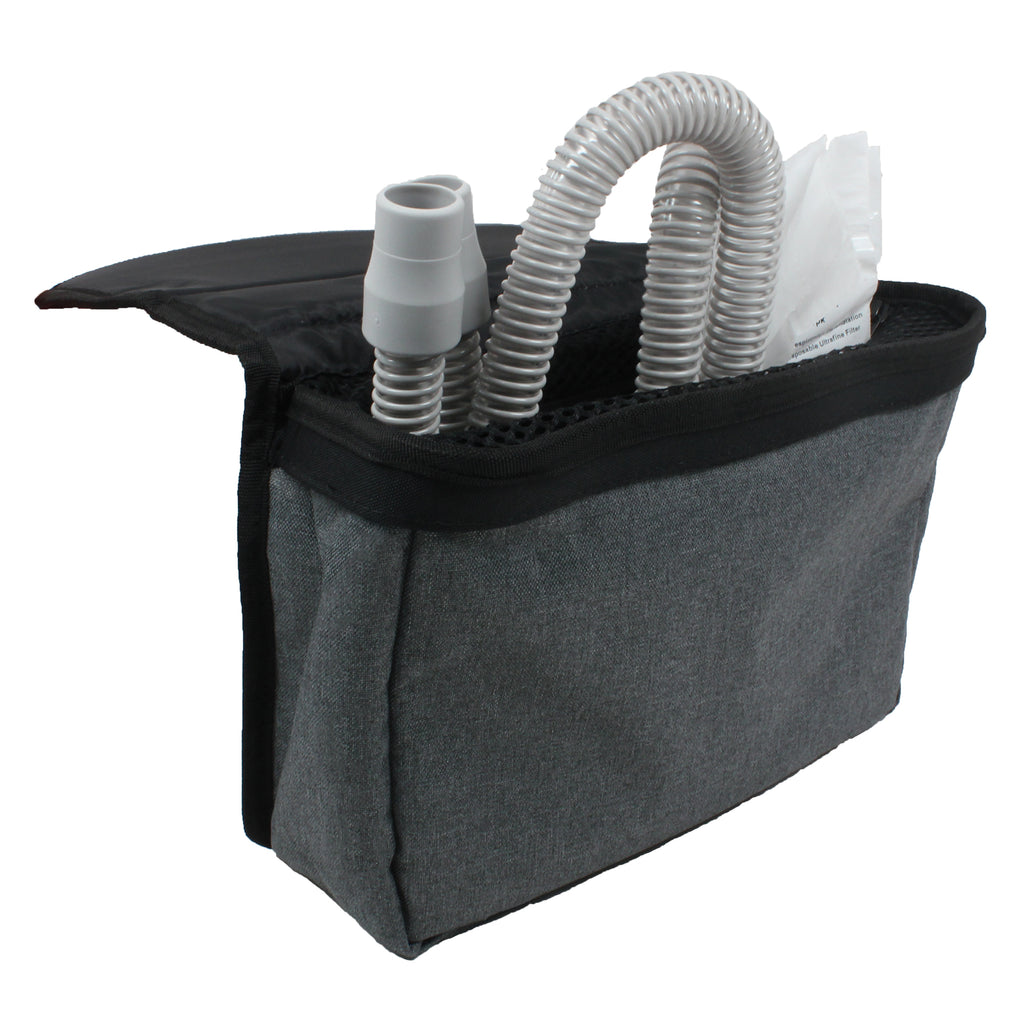 Gray carrying case with medical equipment on a white background