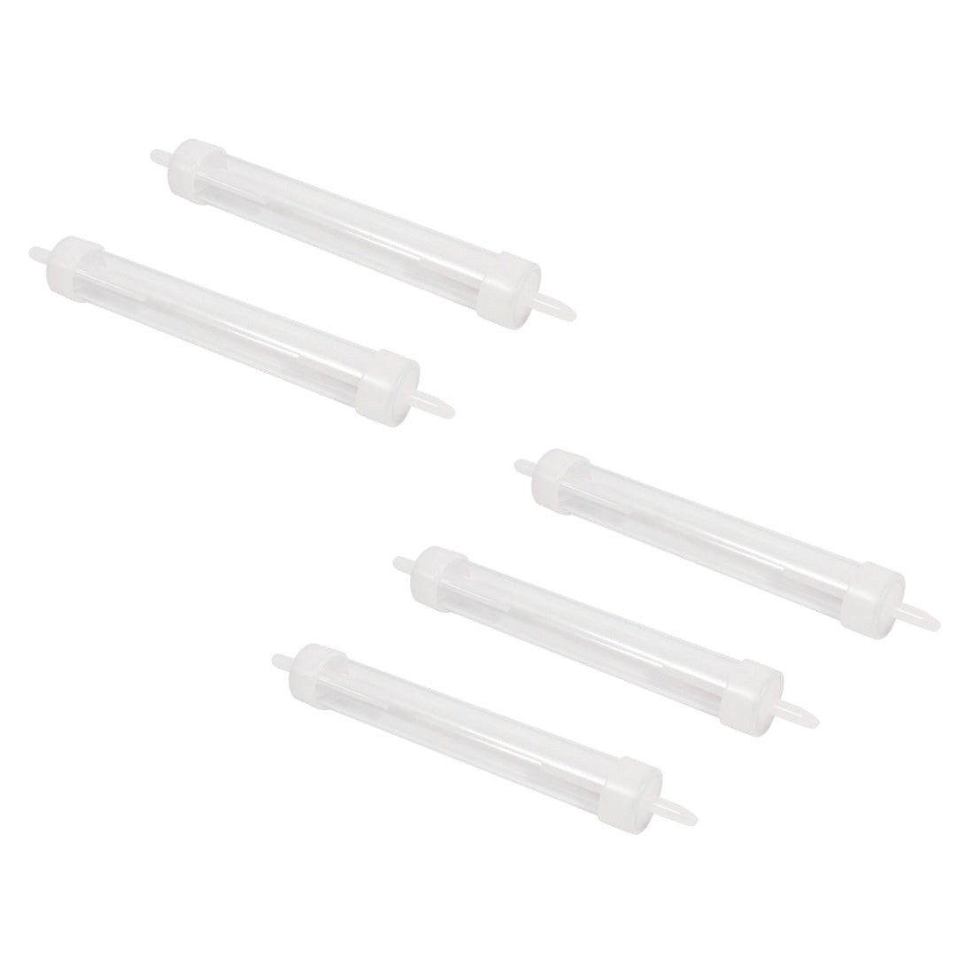 5 white inline water traps scattered on a white background
