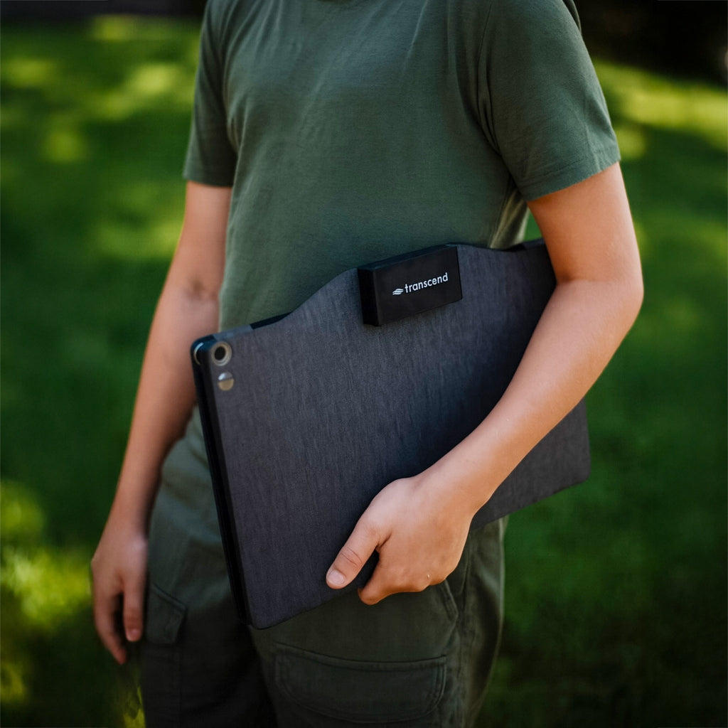 Man Holding 40W Transcend Sun-Watt Solar Panel Charger