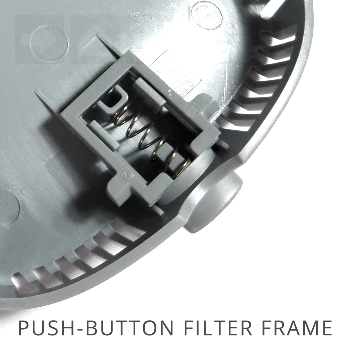 Close-up of a push-button filter frame with text on a white background
