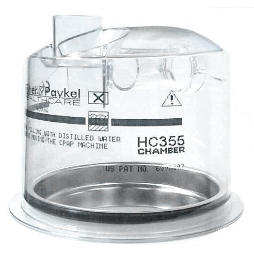 Clear chamber with metal base labeled 'HC355' on a white background