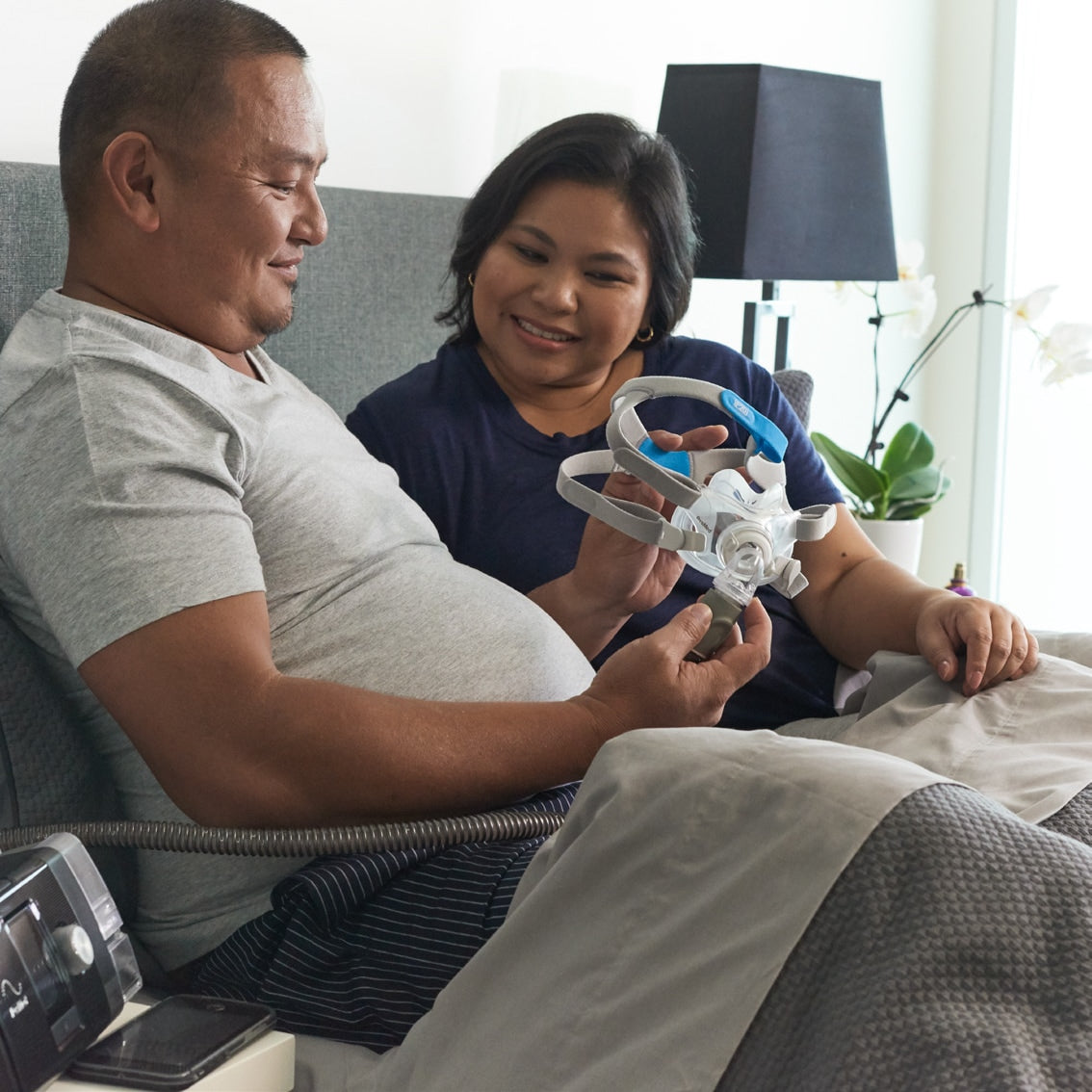 Person using a CPAP machine while sleeping