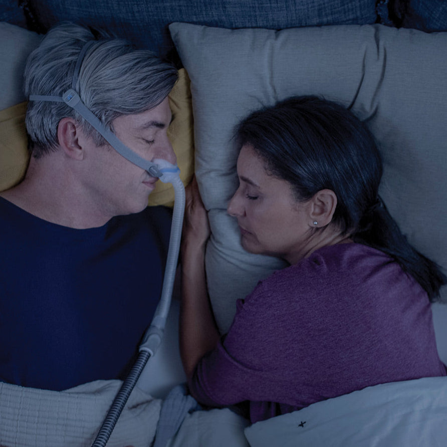 Man Wearing AirFit N30 CPAP Mask While Sleeping 