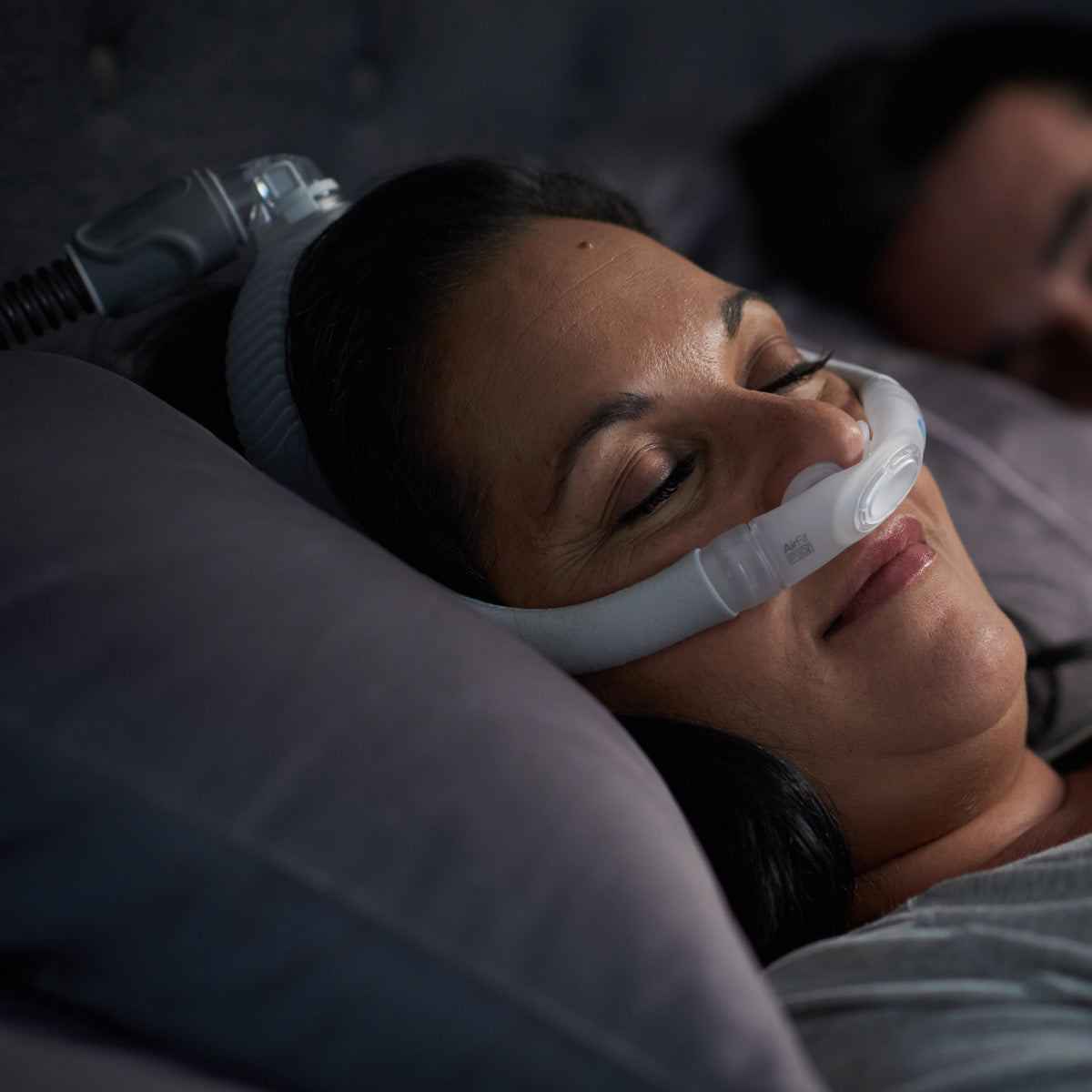 Woman Wearing AirFit P30i CPAP Mask 