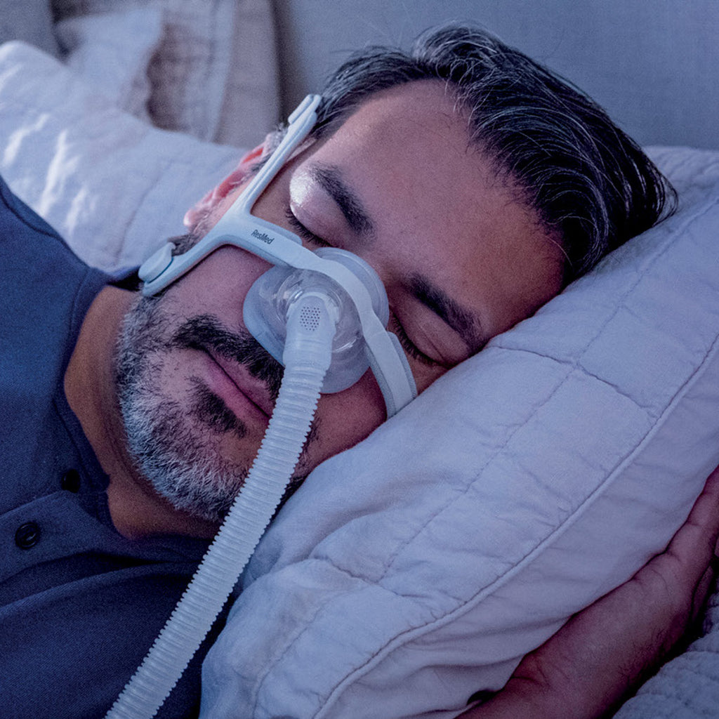 Airtouch N20 CPAP Mask on man while sleeping 