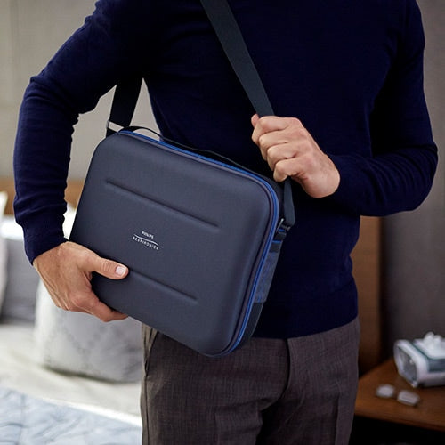 Person wearing a Dreamstation Travel Case 