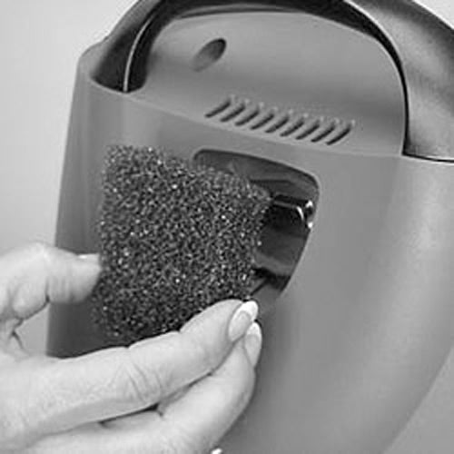 Hand installing a Reusable Foam Filter into an Eclipse Machine 