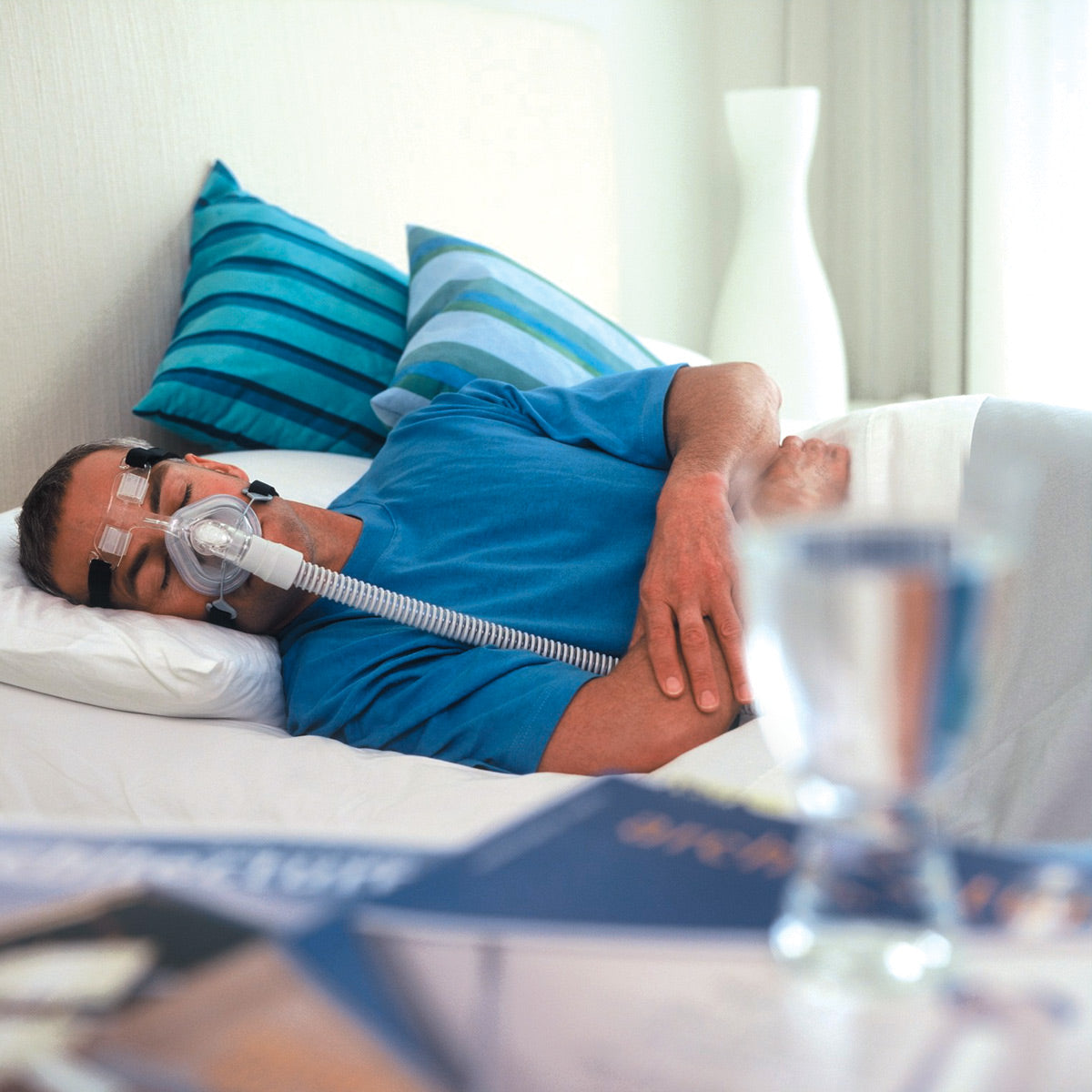 Man In Bed wearing FlexiFit 405 CPAP Mask 