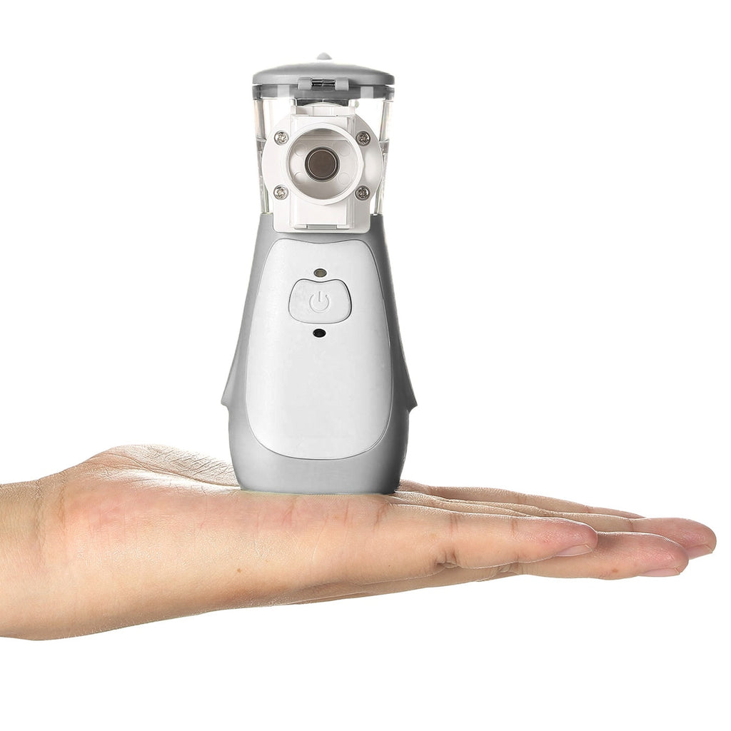 Sunset Mini Mesh Nebulizer on a hand 