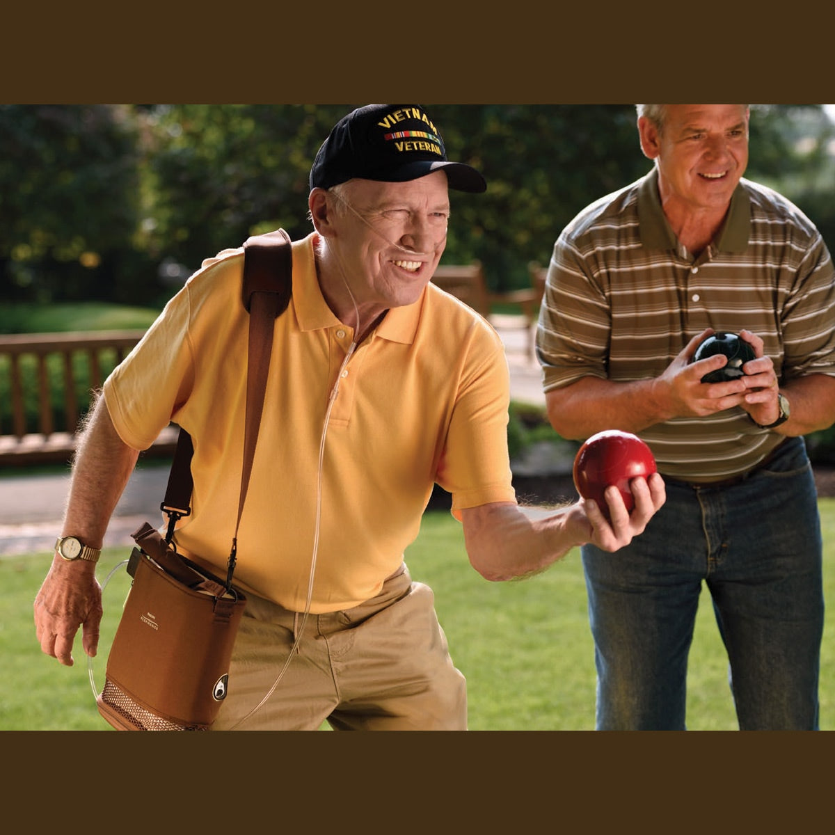 Man using a SimplyGo Mini Concentrator while doing an outdoor sport 