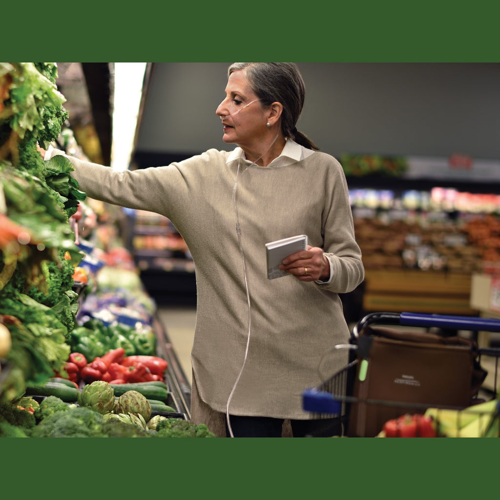 Woman Grocery Shopping while using a SimplyGo Oxygen Concentrator 