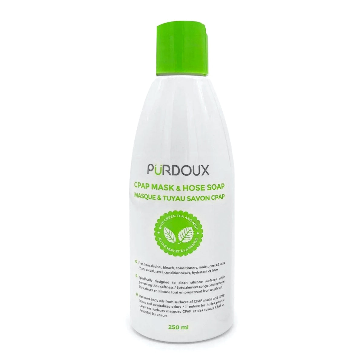 Purdoux CPAP mask and hose soap bottle with green cap on a white background