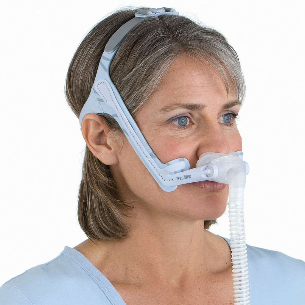 Woman Wearing a Swift LT Nasal Pillow Mask