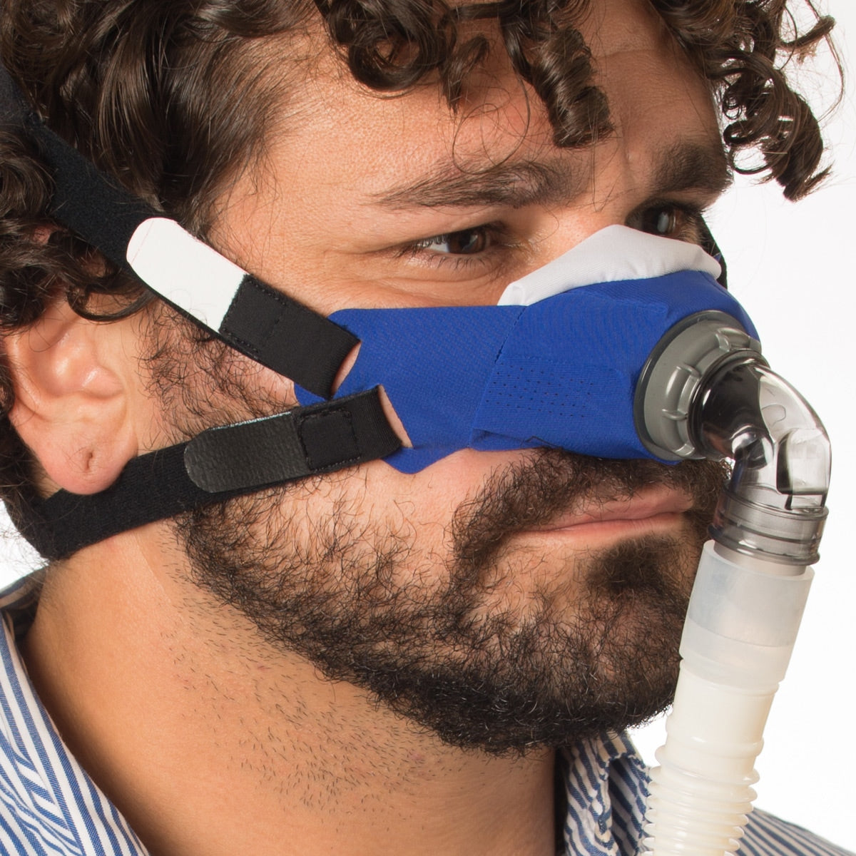 Close Up Of a man wearing a Sleepweaver mask 
