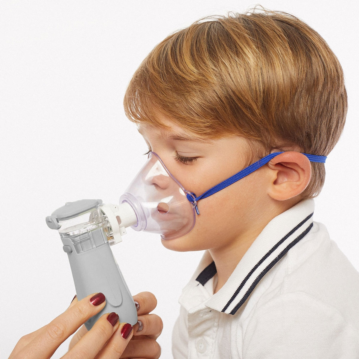 Child Using a Sunset Mini Mesh Nebulizer 